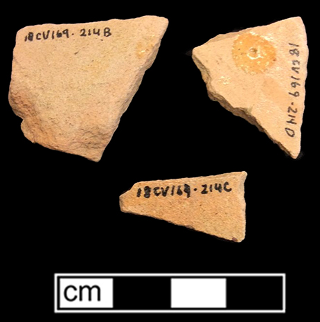 Indeterminate vessel of yellow border ware as identified by J. Pearce 1999. Glazed interior sherds on pink paste on top, and unglazed exterior sherds on bottom. 